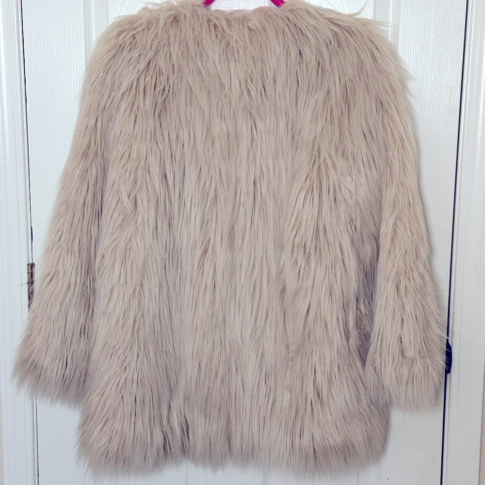 XS/S Lioness cream fur coat.